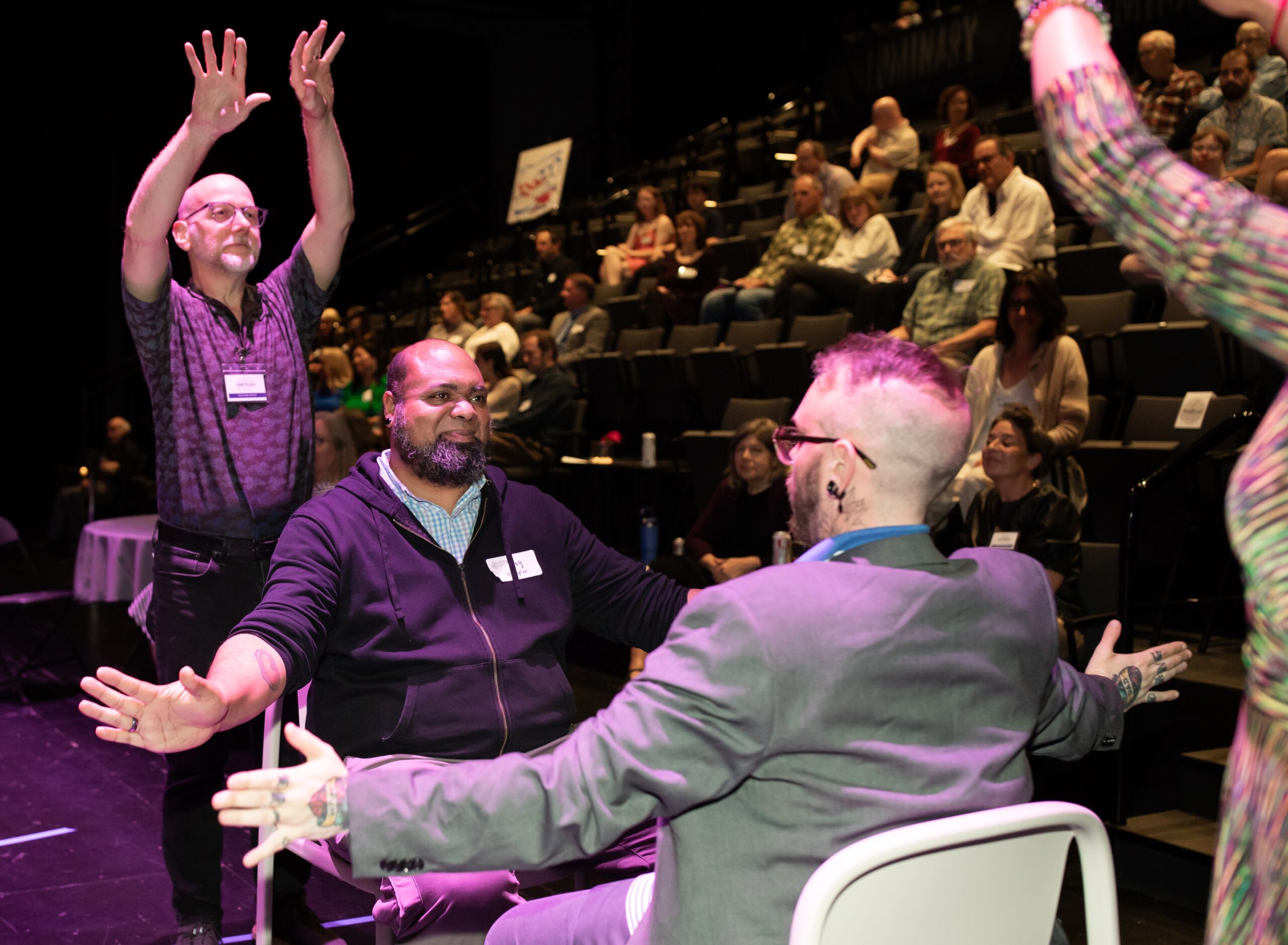 Teaching Artists and attendees mirror each other.