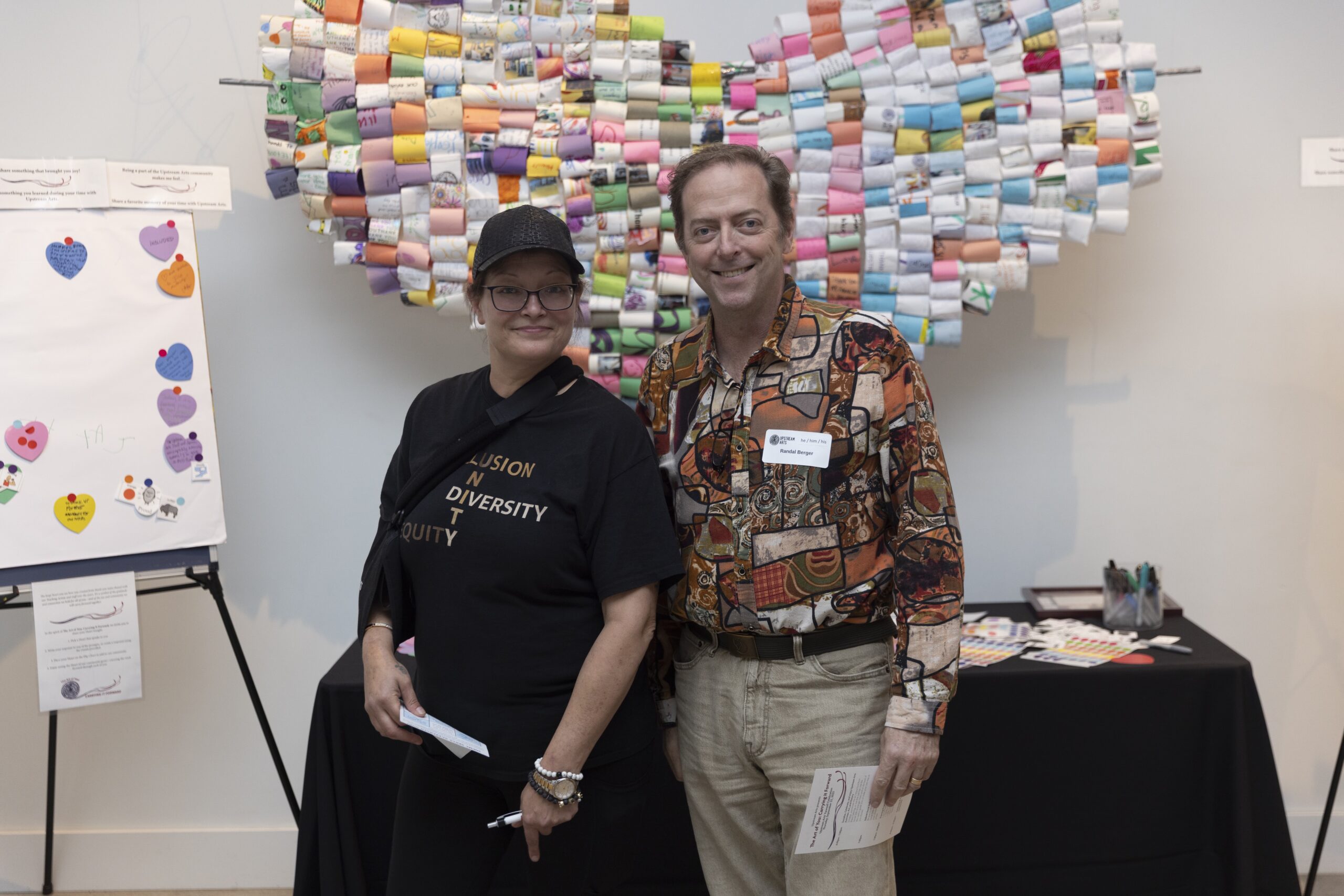 Attendees pose in front of the gratitude heart. Photo by Marla.